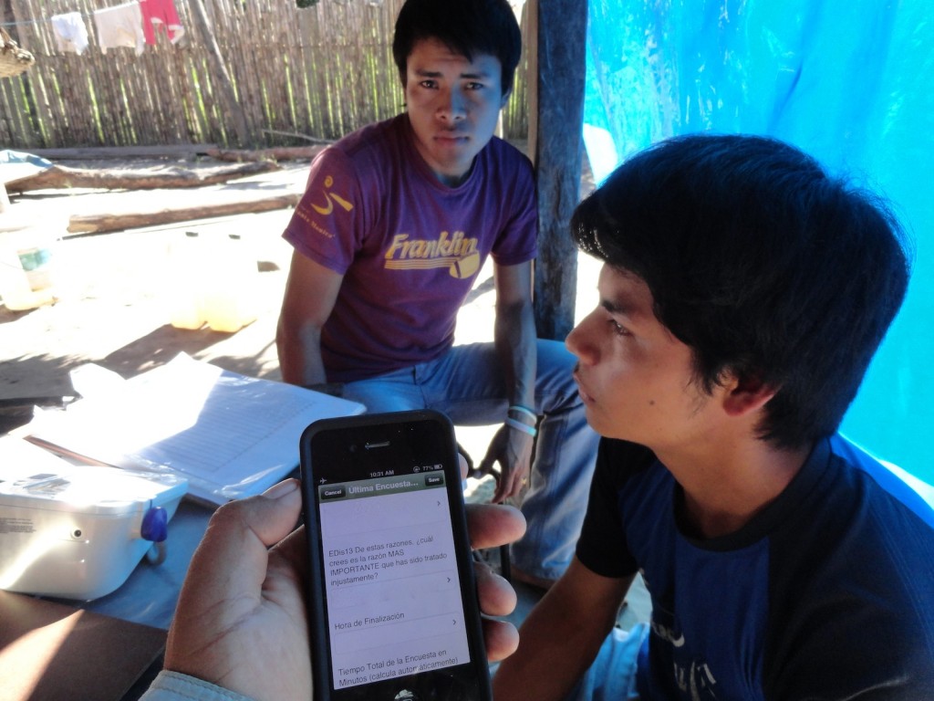 Administering an epidemiologic survey to a Tsimane' participant.